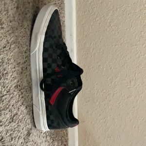 Vans, Grey, Black, and Red. Size 5.5. Used but in good condition.